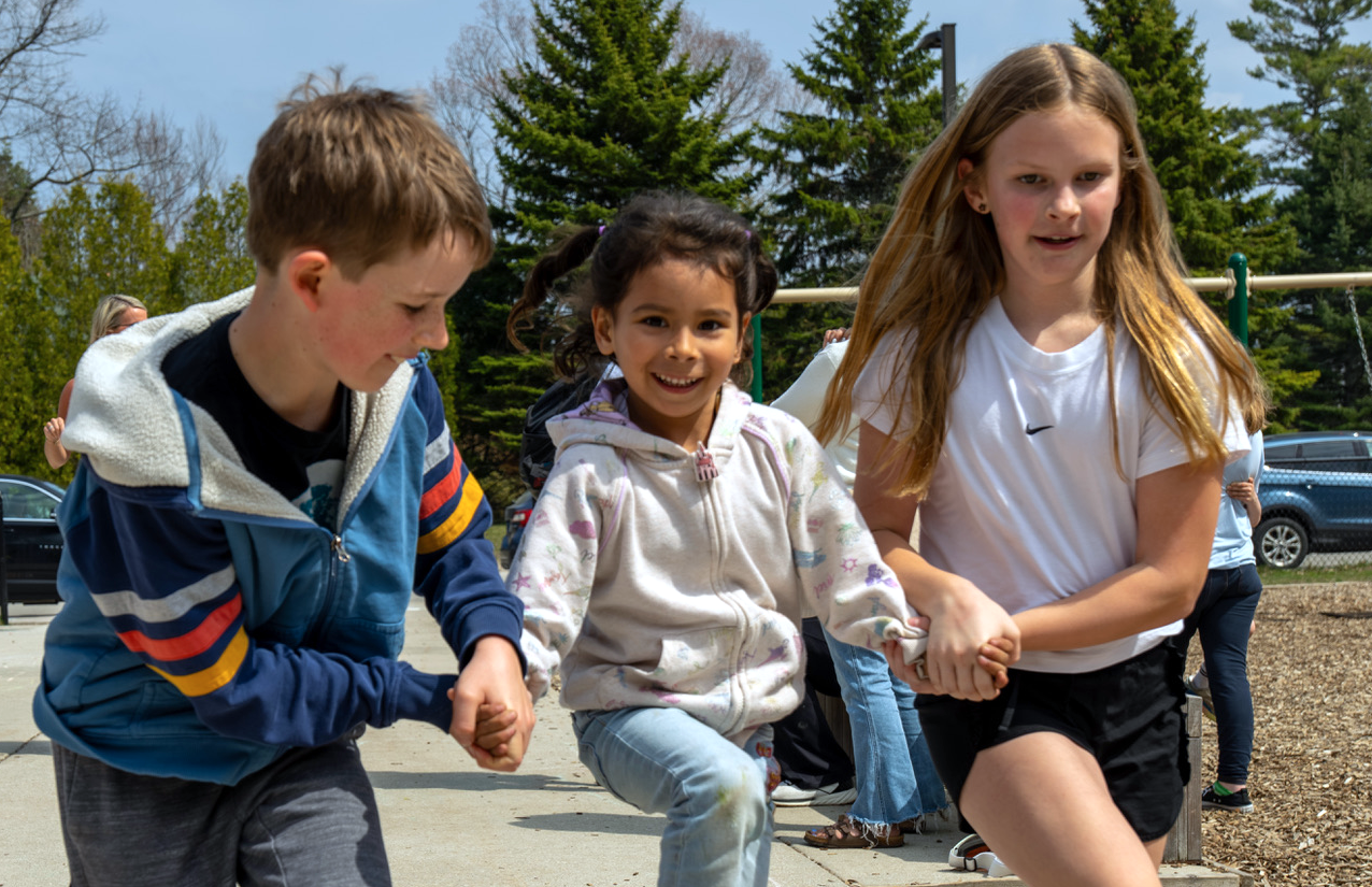 three students at recess